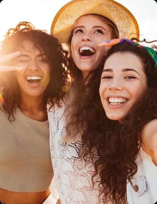 Three women posing for a photo